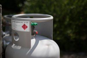 Photo of propane cylinder with warning label