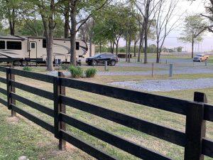 RV sites with full hookups surrounded by mature trees at The Park on Whiskey Road, Grand Lake, Oklahoma